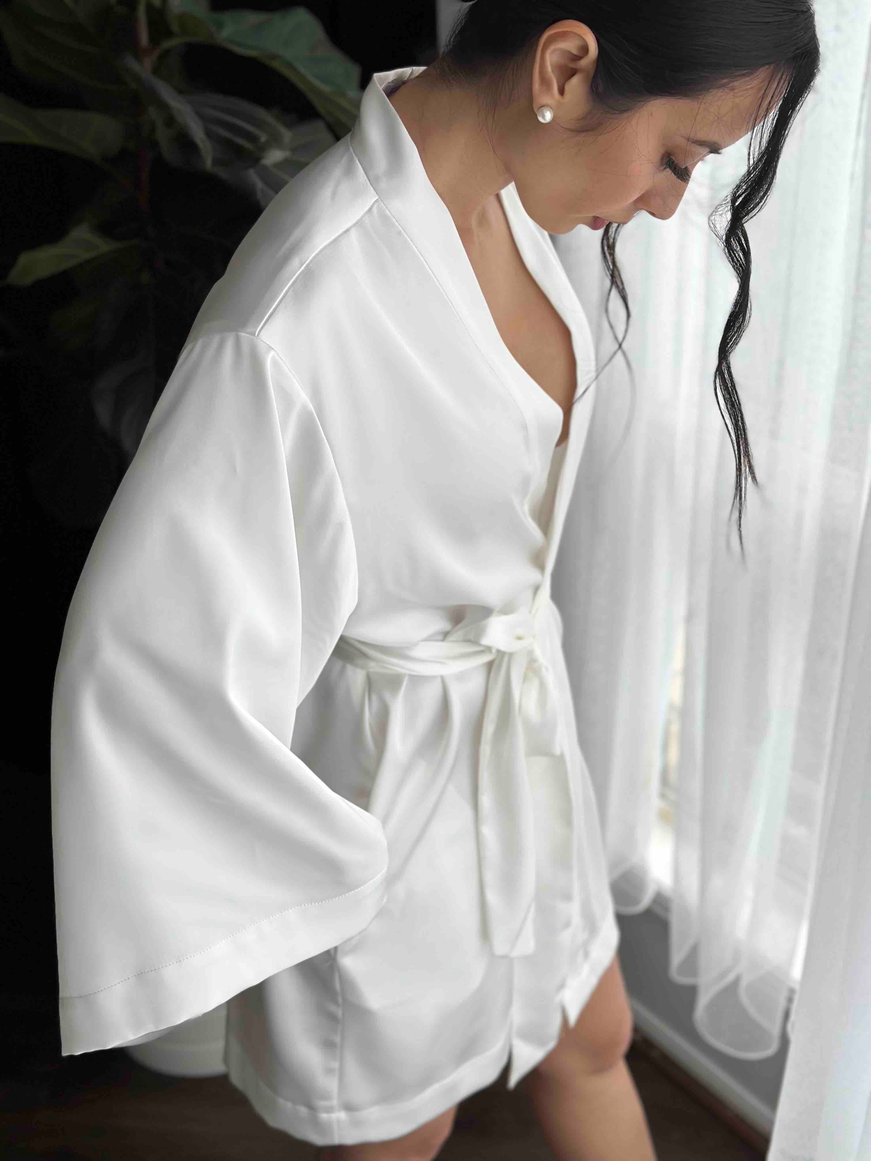 knee length bridal robe with waist band tied up in a bow