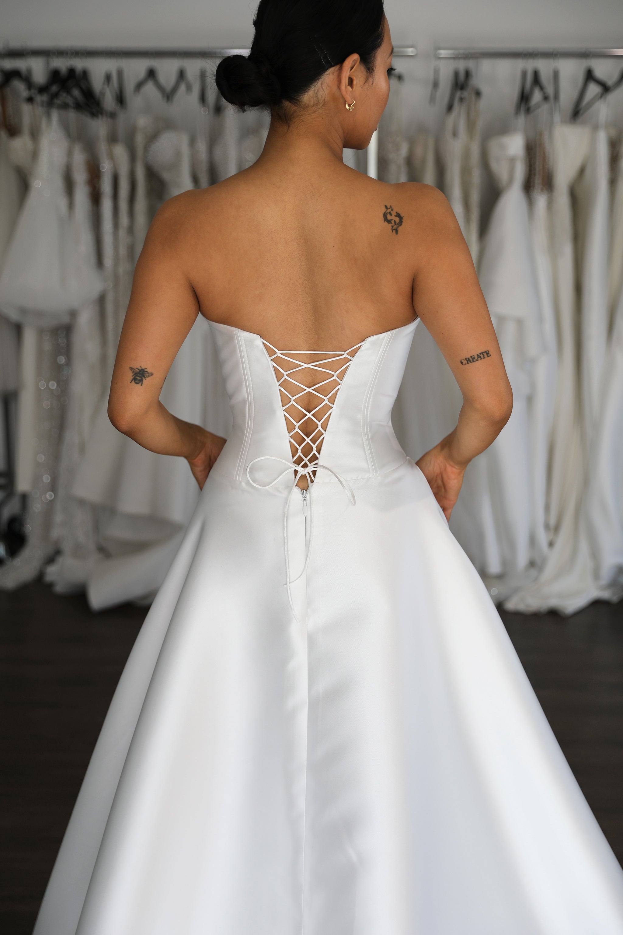 lace up low cut back on white mikado wedding gown