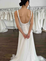 low back details on pearl and tulle wedding dress