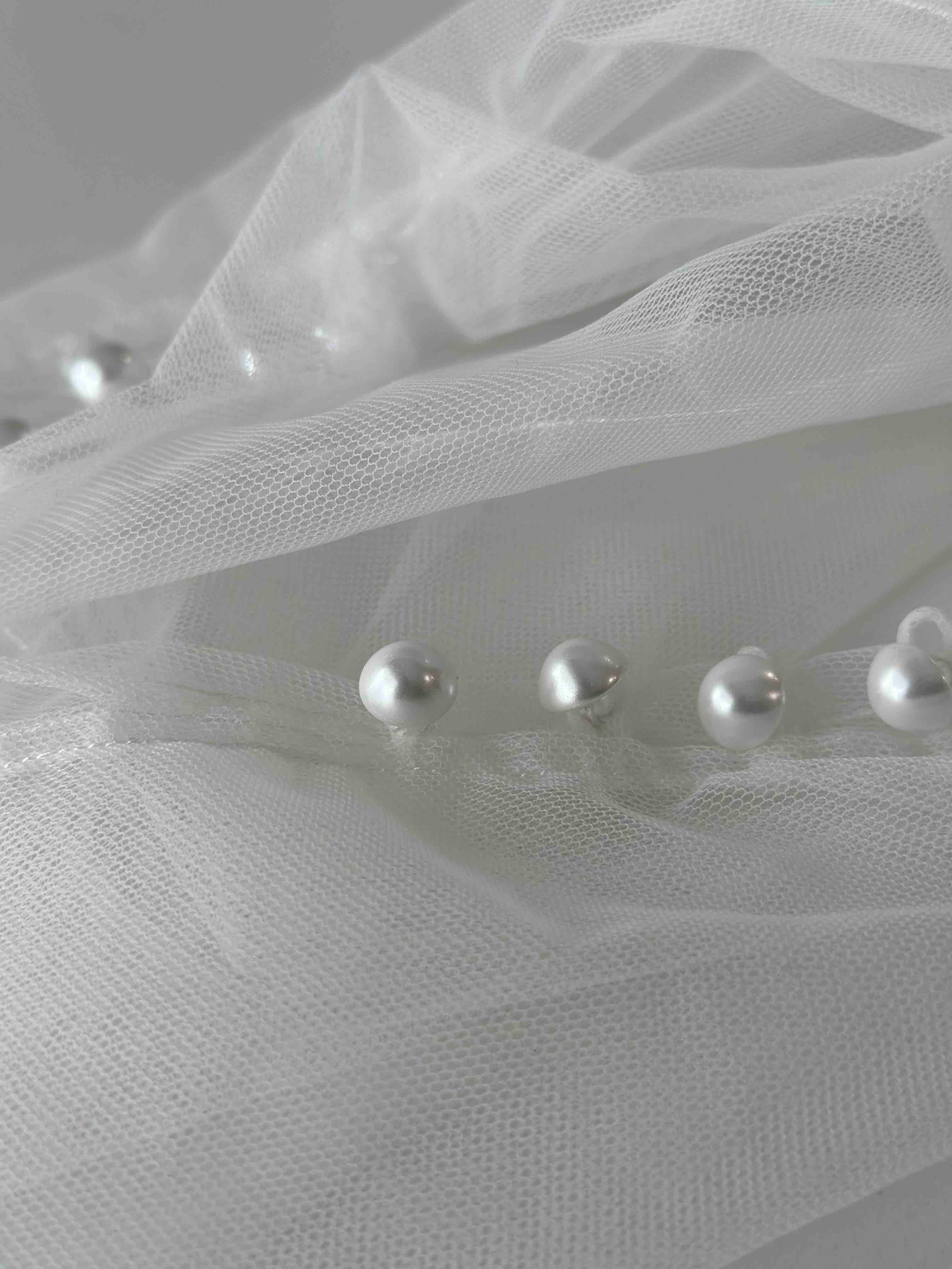 pearl buttons on tulle