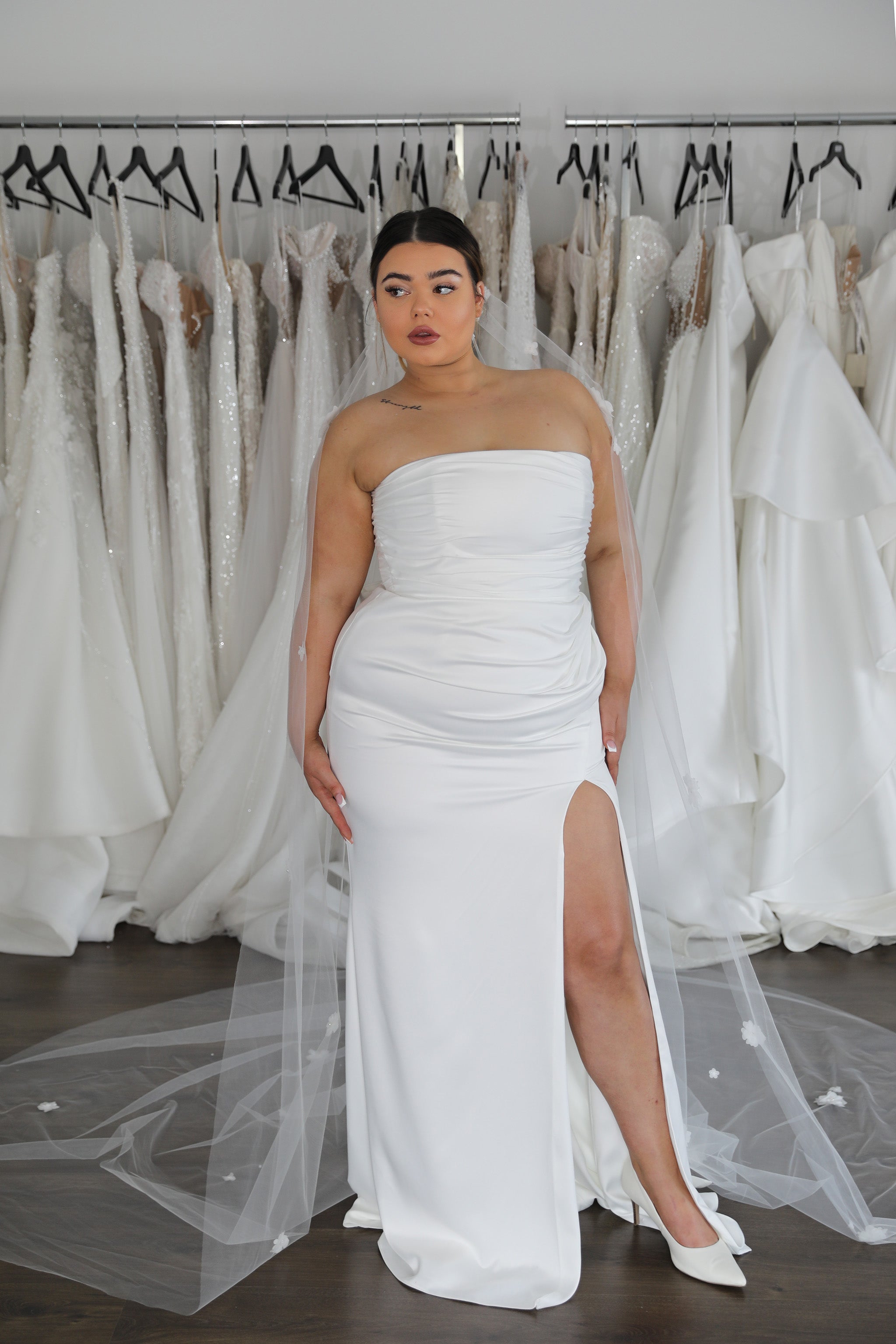 straight neck white wedding dress with thigh split