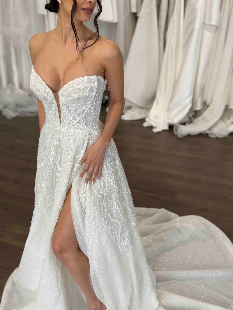 strapless wedding gown with beaded lace and thigh split