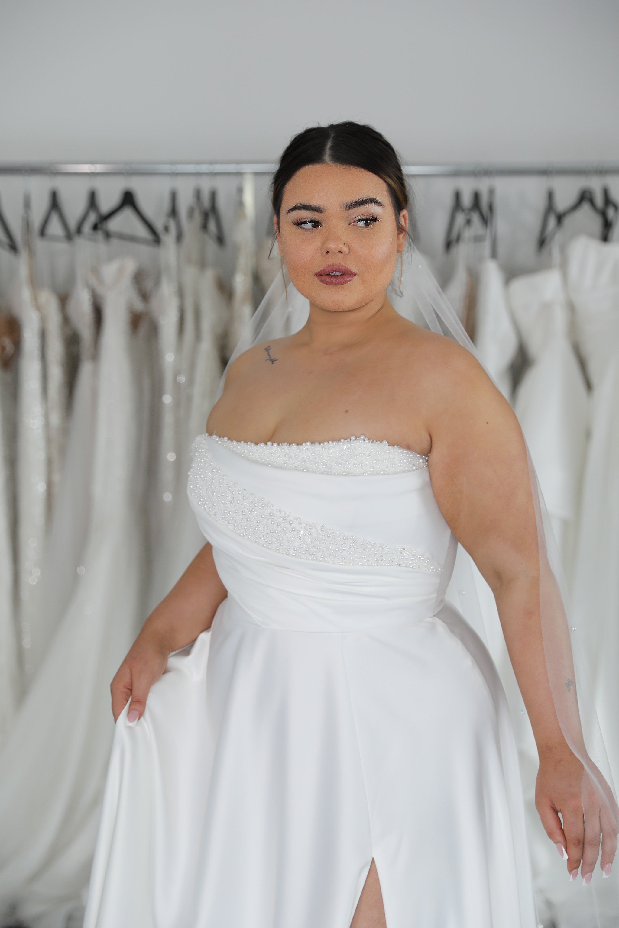 strapless white wedding dress with pearl detail bodice and thigh split