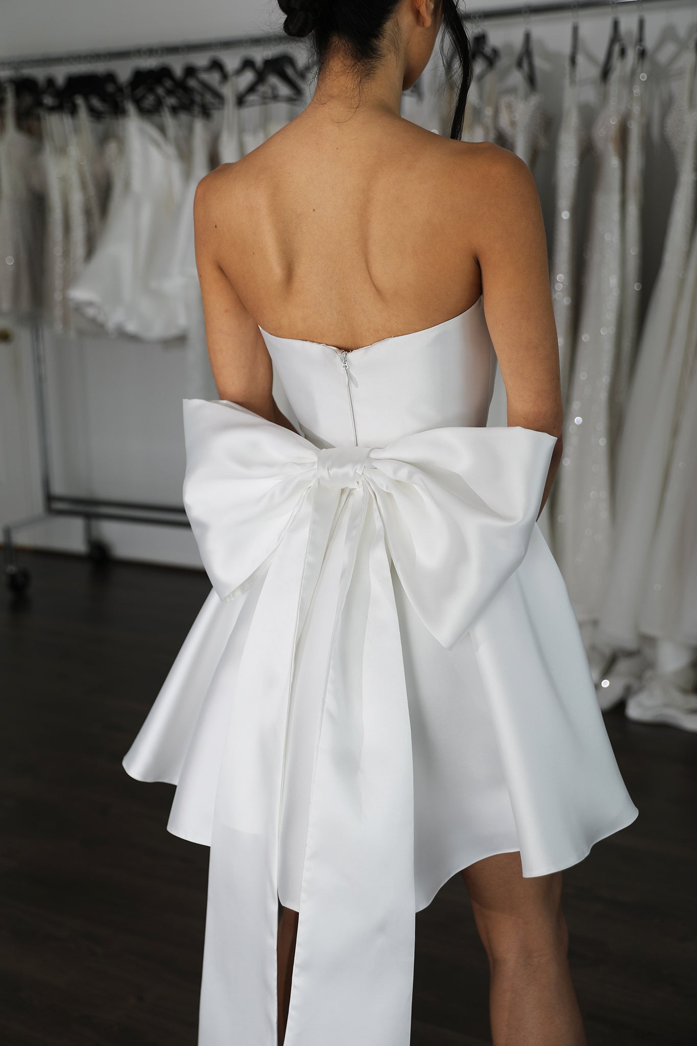 striking white mikado wedding bow on mini dress