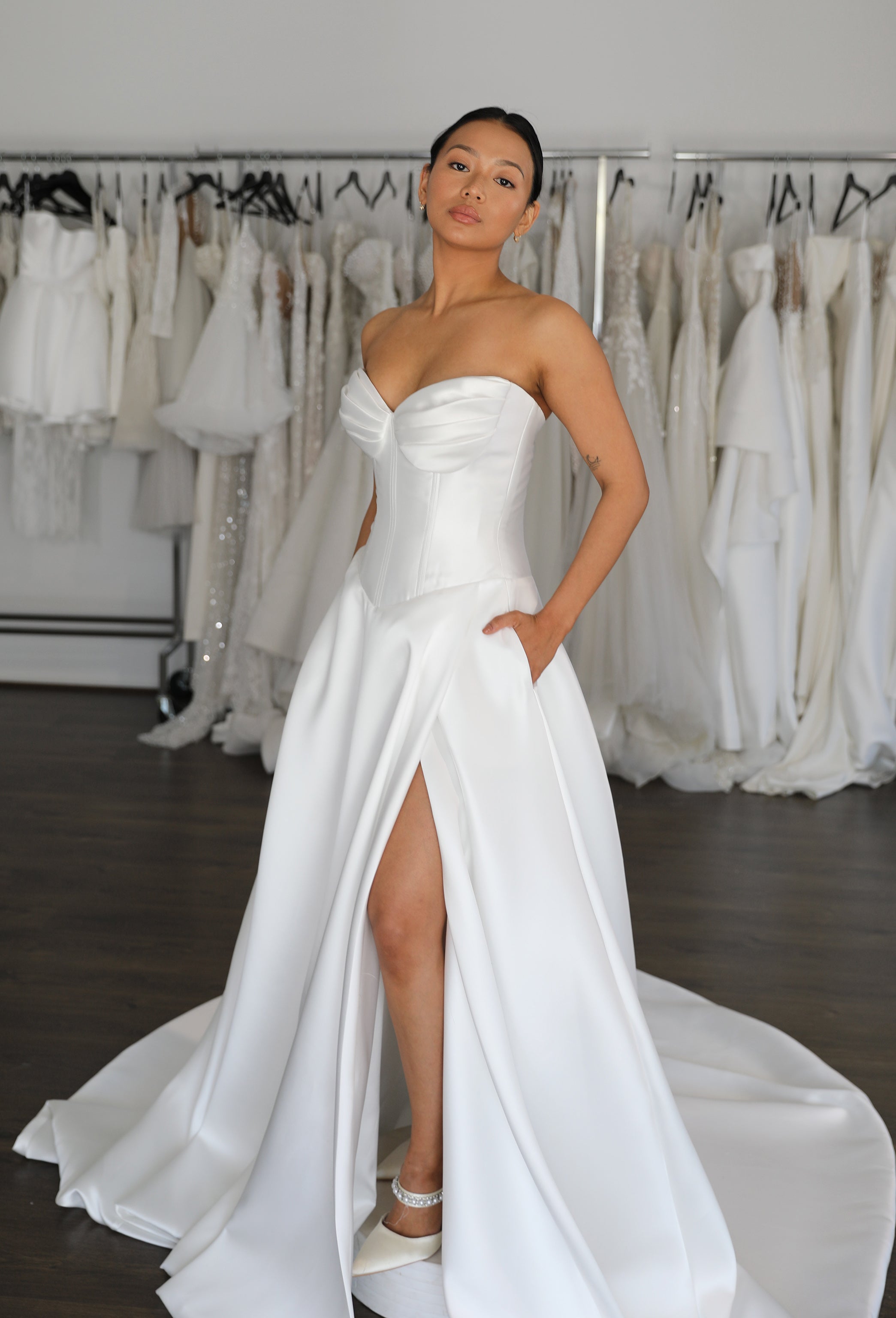 thigh high slit and strapless neckline with pleated cups on white mikado wedding dress