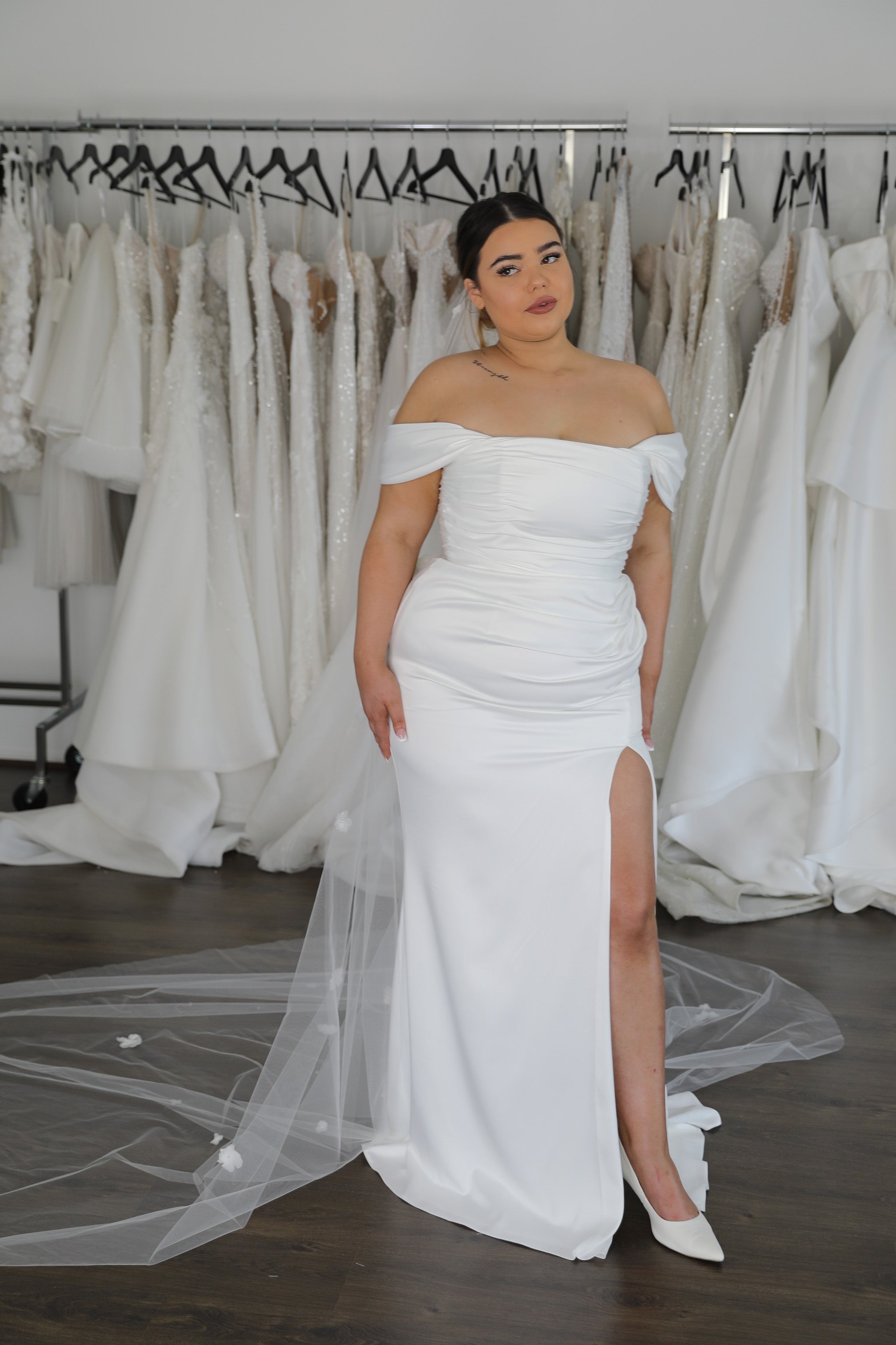 thigh high split on white plus size wedding dress