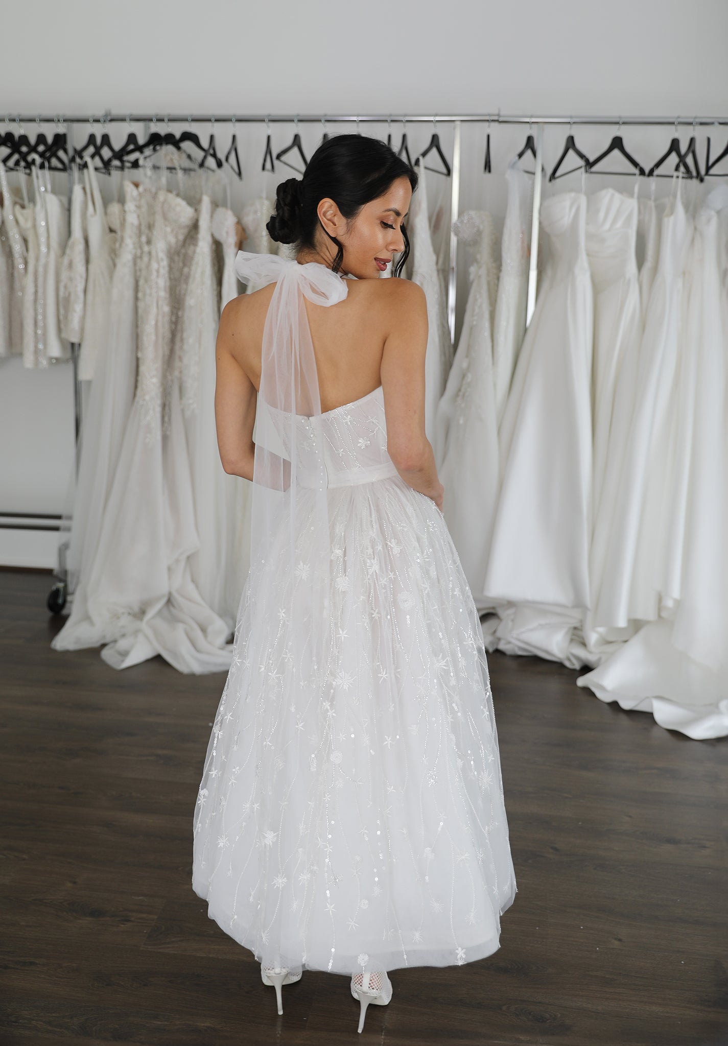 tulle neck tie and midi length wedding dress