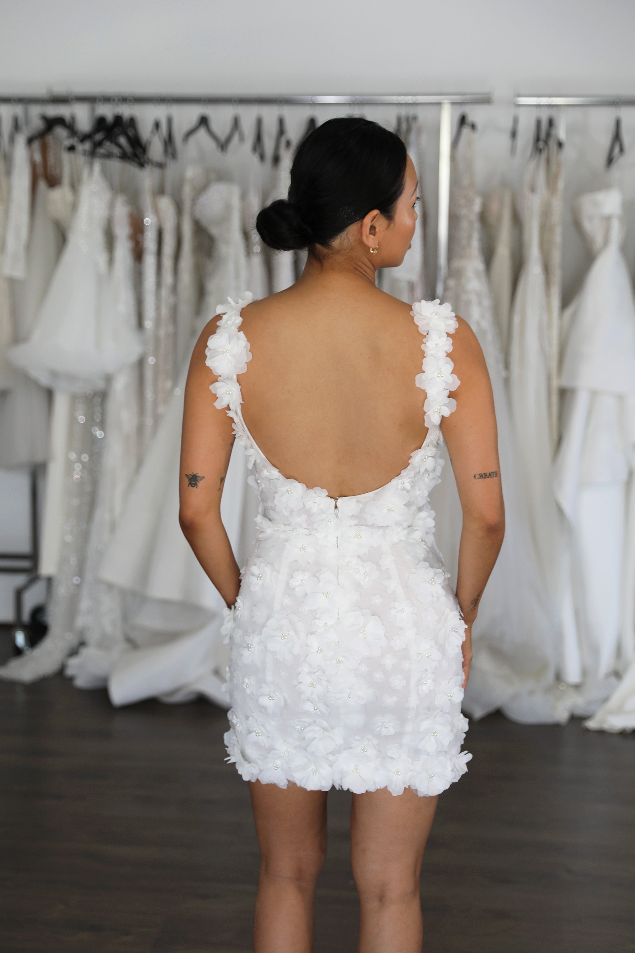 U-back floral mini wedding dress on bride