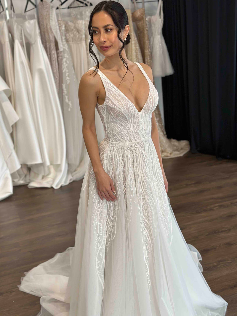 v-neck vine lace wedding dress on bride
