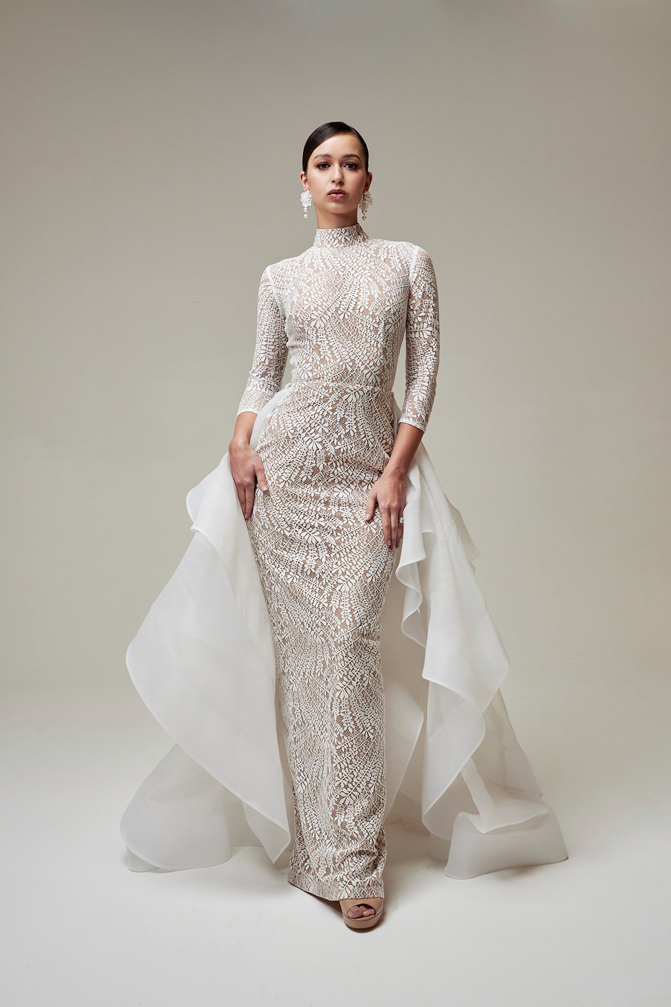 wedding dress with flowing half outer skirt
