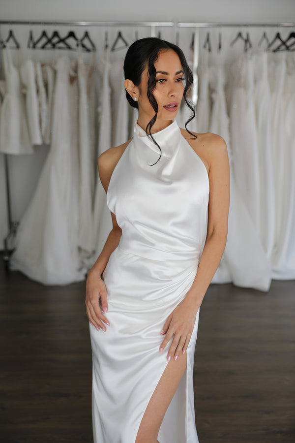 wedding reception gown with halter neck and thigh split