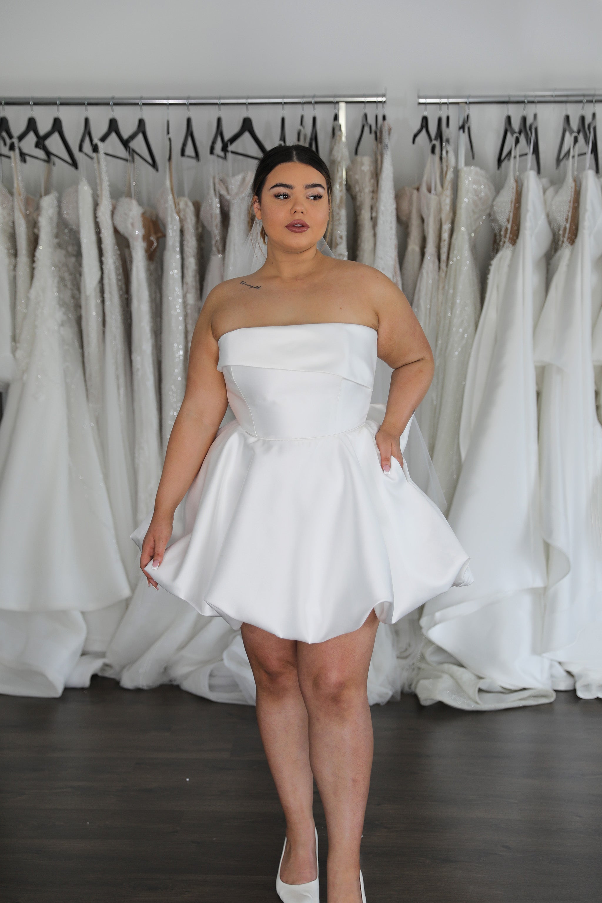 white mikado mini wedding dress on plus size model