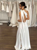 white slip dress with side split and one shoulder design