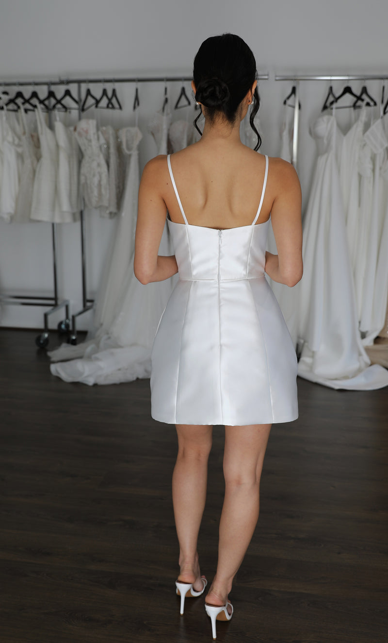 woman wearing short wedding gown with thin straps