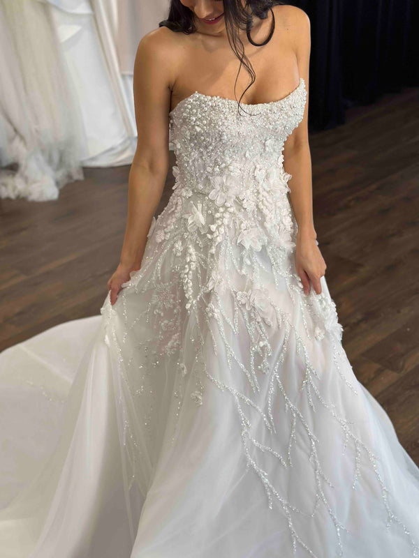 couture lace wedding gown with pearls and tulle flowers