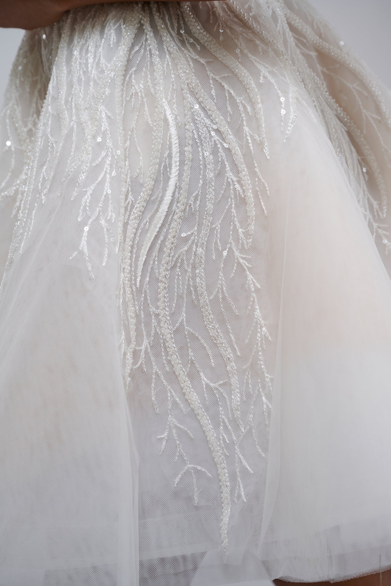 flowing lace overlay on a tulle skirt