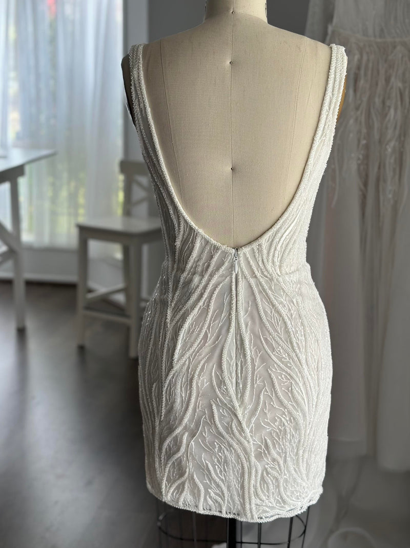 mini lace reception dress on mannequin