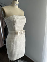 mini wedding gown on mannequin