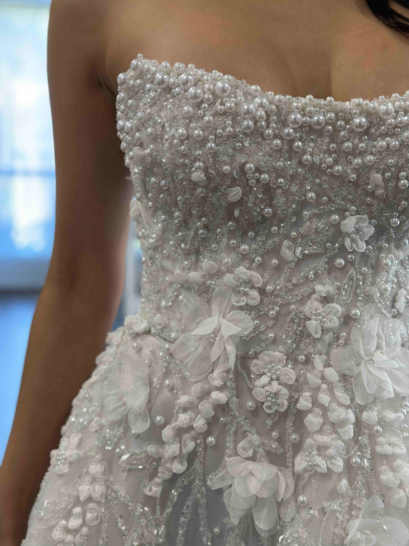 pearls and lace on bodice of wedding dress