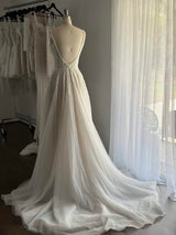 wedding dress on dress form in showroom