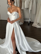white mikado wedding dress with thigh high split